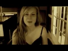 This playgirl on a webcam dances provocatively while barefaced.